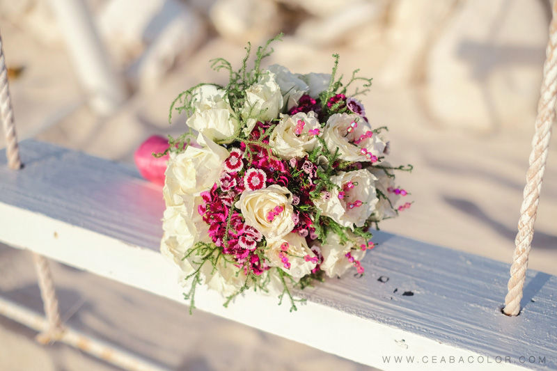 intimate boracay beach wedding pink bouquet